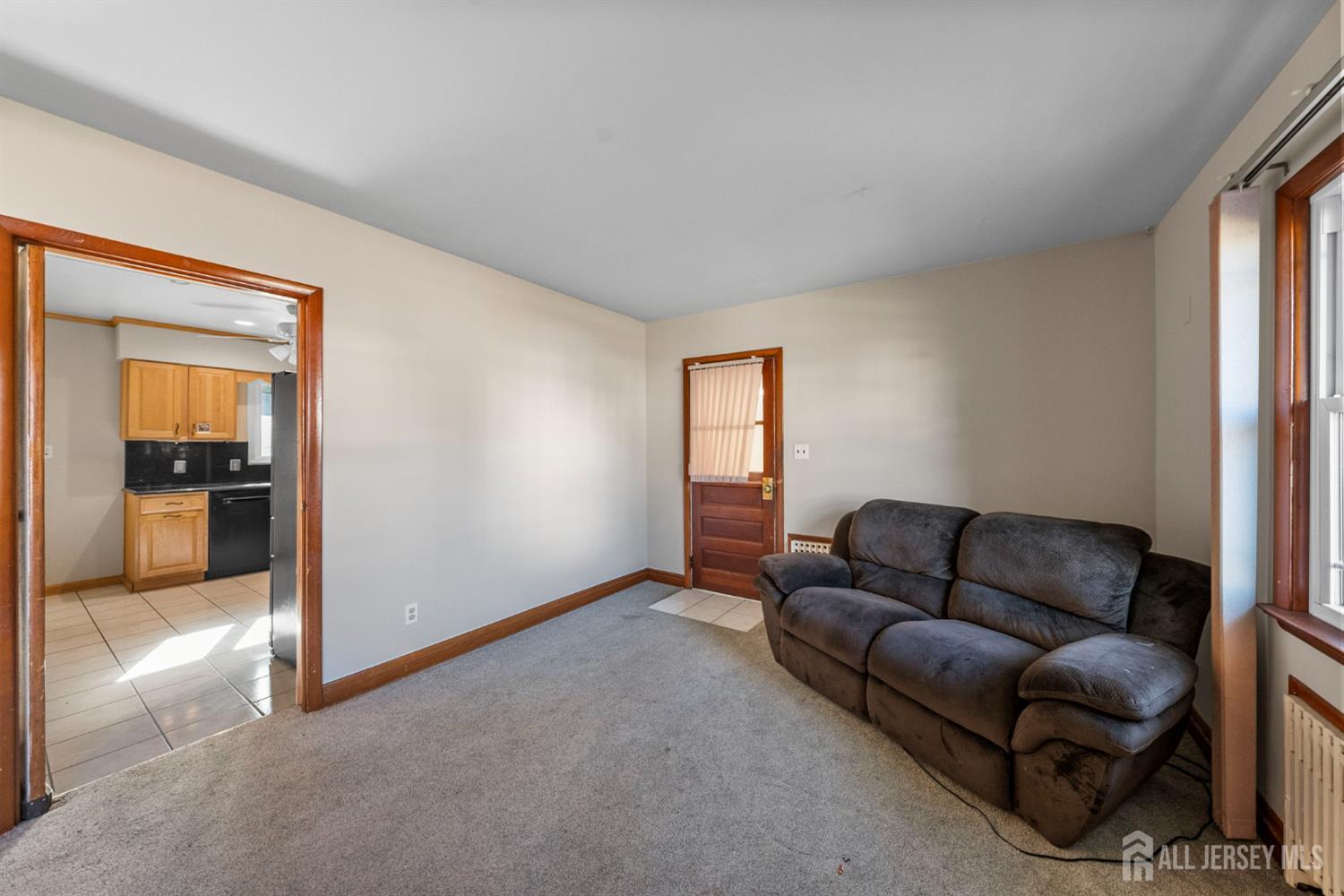 926 Hermann Road North Brunswick, NJ 08902 - Photo 7 of 54 a living room with furniture and a window