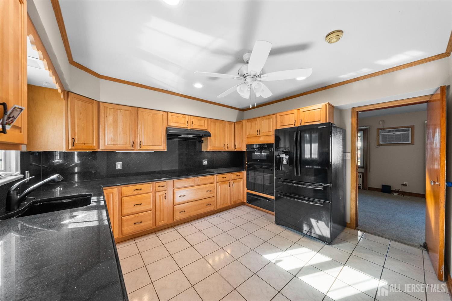 926 Hermann Road North Brunswick, NJ 08902 - Photo 10 of 54 a large kitchen with stainless steel appliances granite countertop a refrigerator and a sink