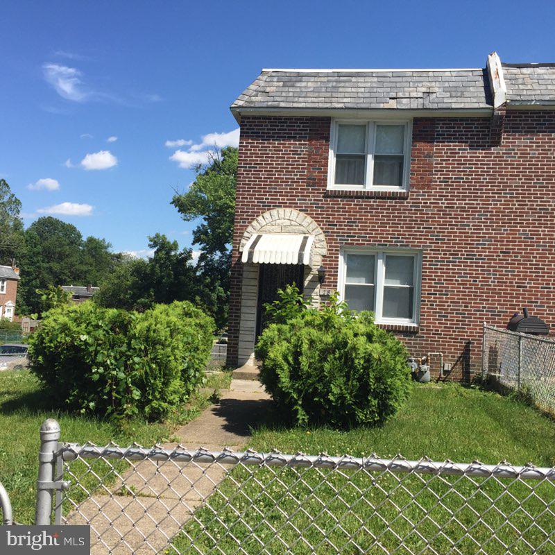 28 Ashbourne Road Darby, PA 19023 - Photo 1 of 22 Front view fenced in yard