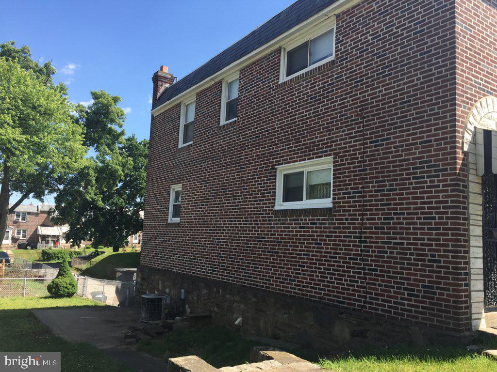 28 Ashbourne Road Darby, PA 19023 - Photo 4 of 22 Side view of home