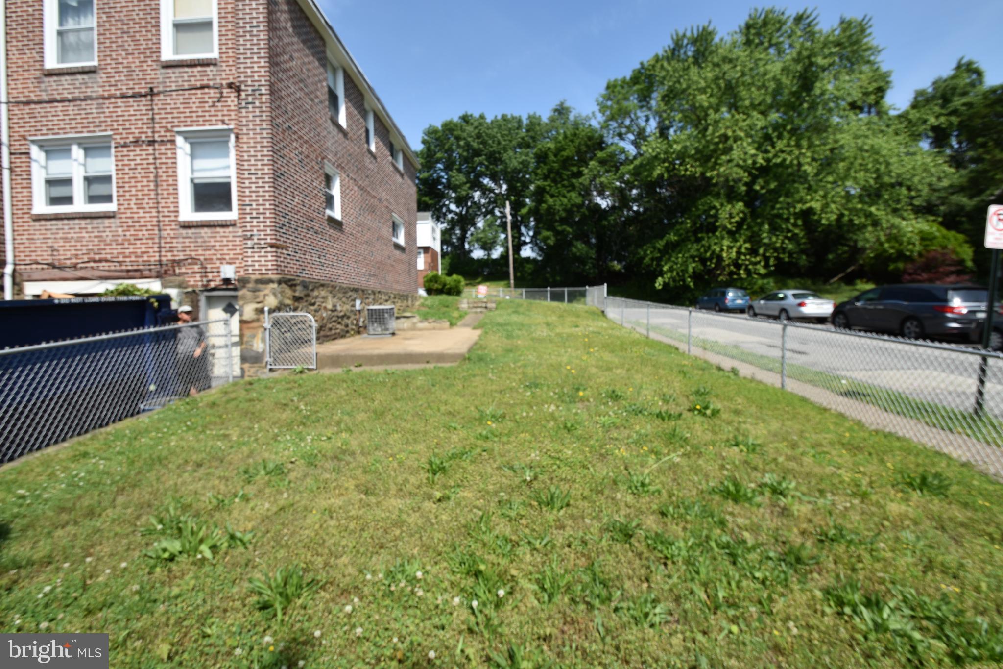 28 Ashbourne Road Darby, PA 19023 - Photo 5 of 22 Large fenced in side yard with patio