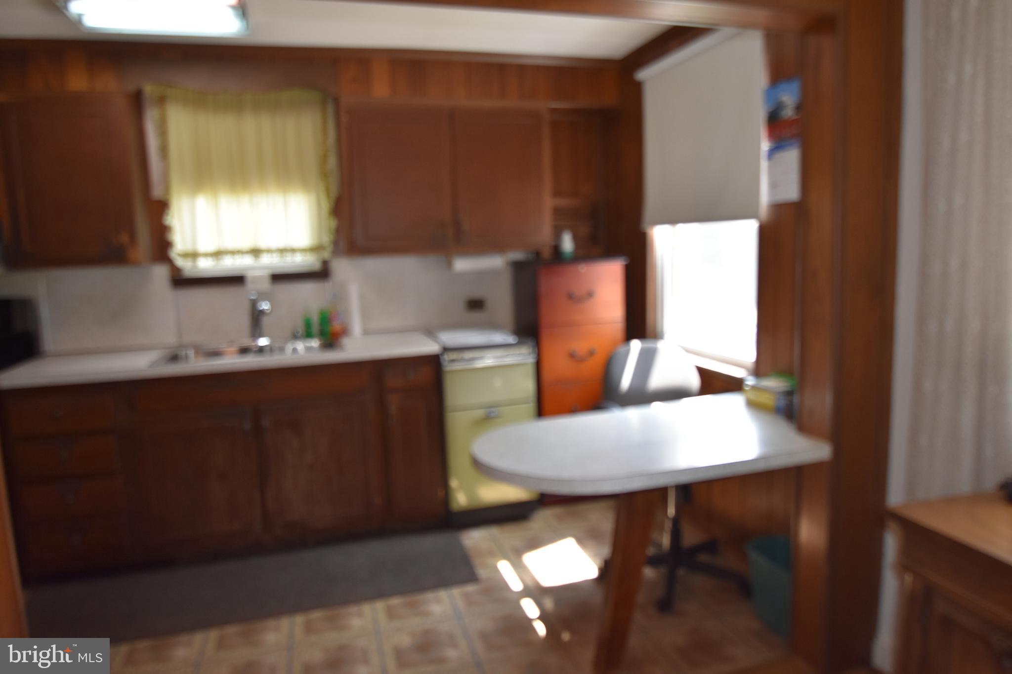 28 Ashbourne Road Darby, PA 19023 - Photo 10 of 22 Eat in Kitchen w/Breakfast bar