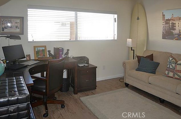 3111 4th Street, Unit 218 Santa Monica, CA 90405 - Photo 7 of 11 a view of workspace with wooden floor windows