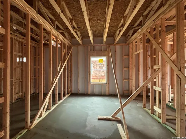 a view of entryway with wooden door