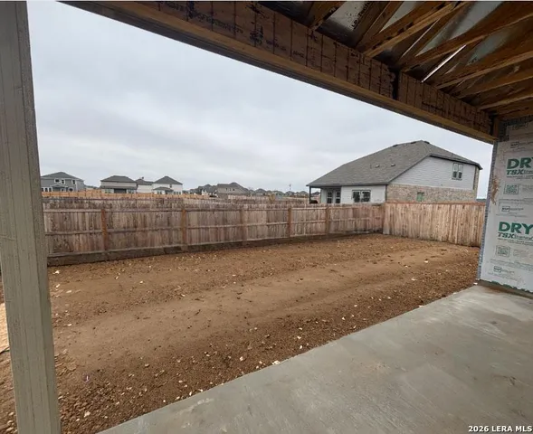 a house with trees in the background