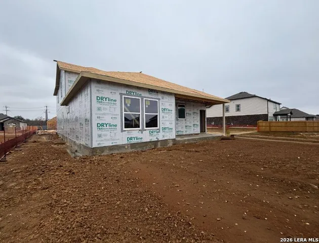 a view of a lake with a building in the background