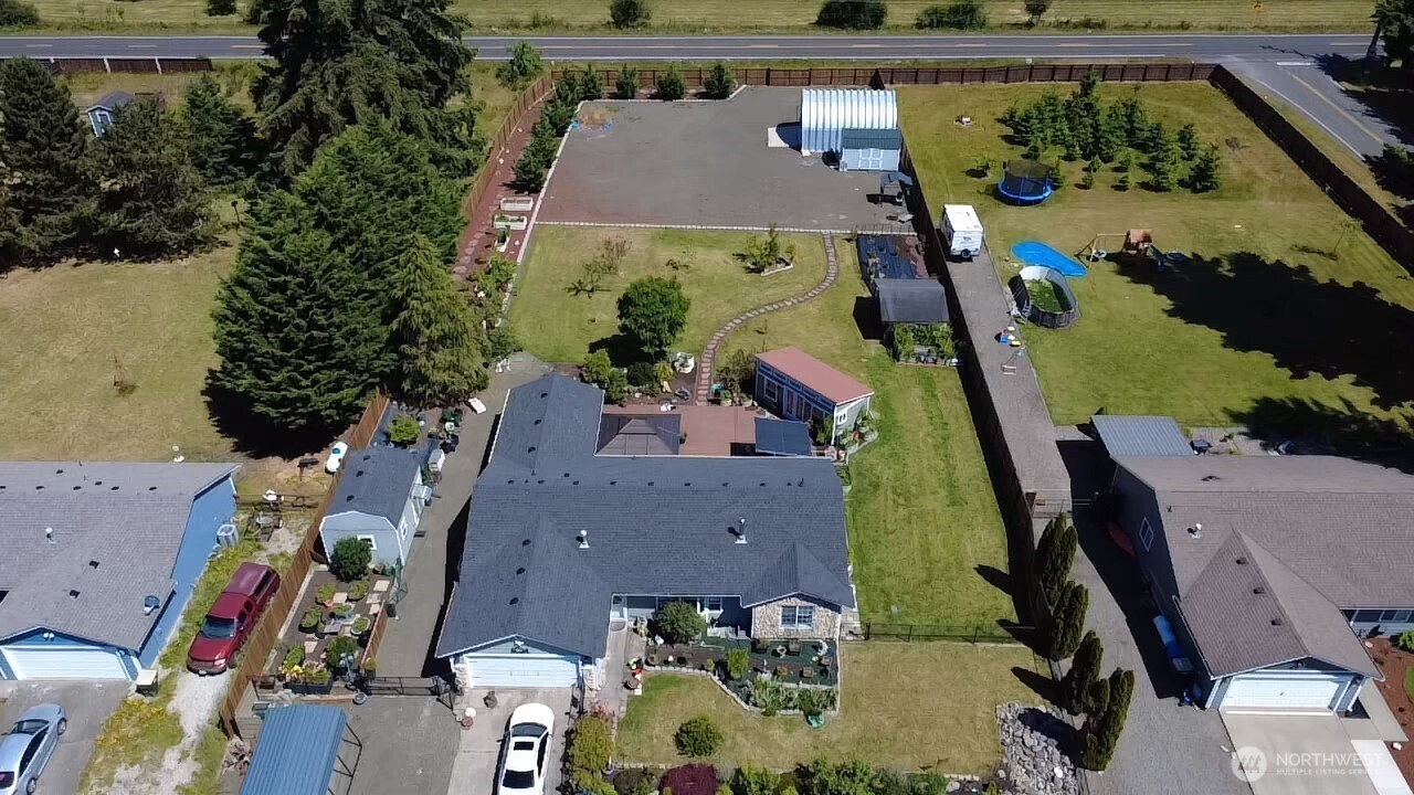 5922 184th Lane Southwest Rochester, WA 98579 - Photo 31 of 34 an aerial view of a house with a swimming pool