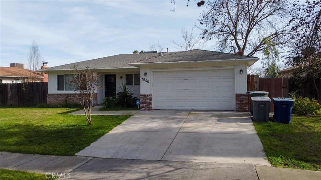 1840 Cheyenne Drive Merced, CA 95348 - Photo 3 of 90 a front view of house with a garden