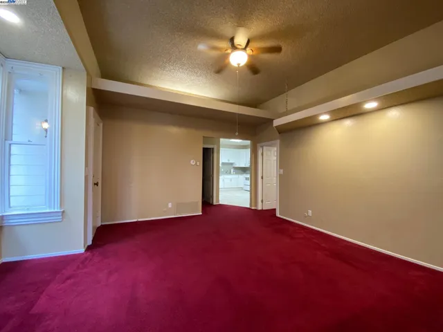a view of empty room with windows
