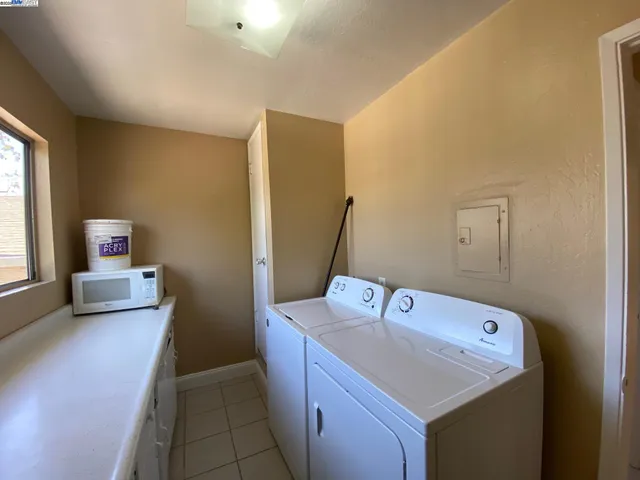 a bathroom with a sink toilet