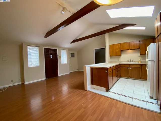 a view of a backyard with a sitting area