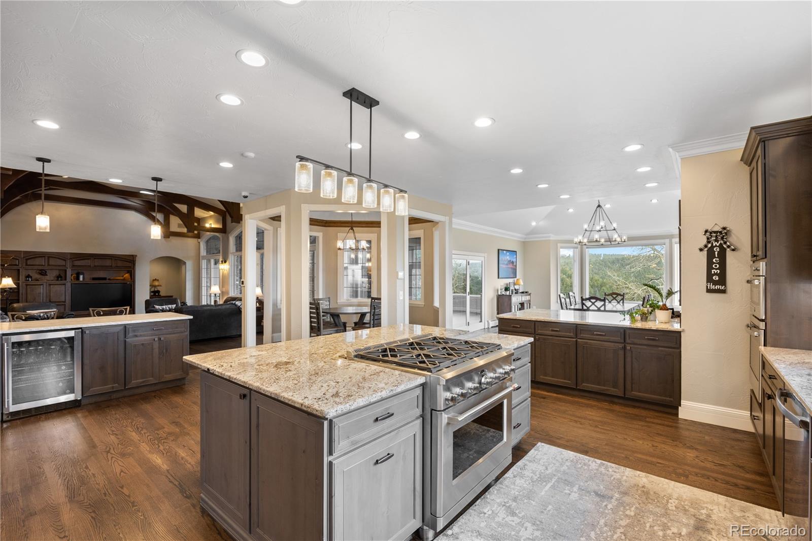 26269 Richmond Hill Road Conifer, CO 80433 - Photo 16 of 44 a kitchen with a stove sink and refrigerator