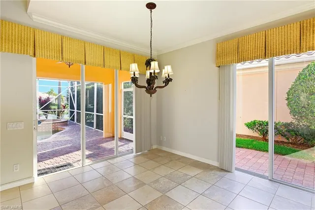 a view of a room with a large window