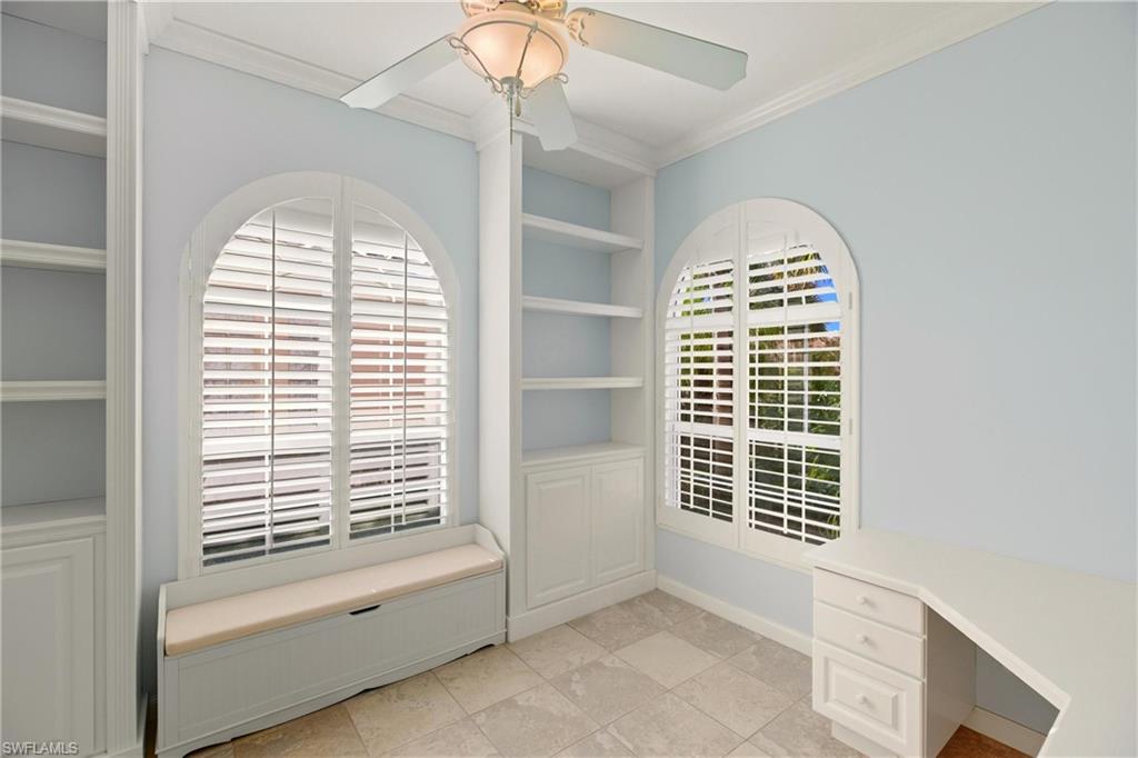 7704 Hernando Court Naples, FL 34114 - Photo 15 of 41 a view of an empty room with a window