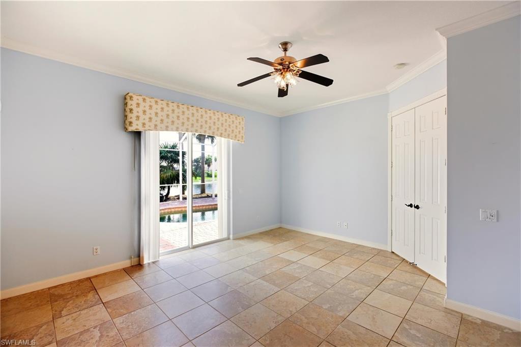 7704 Hernando Court Naples, FL 34114 - Photo 19 of 41 a view of an empty room with window
