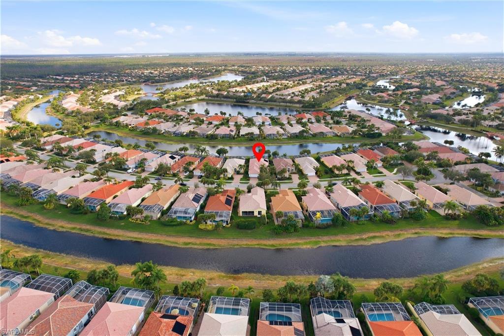 7704 Hernando Court Naples, FL 34114 - Photo 40 of 41 an aerial view of residential houses with outdoor space