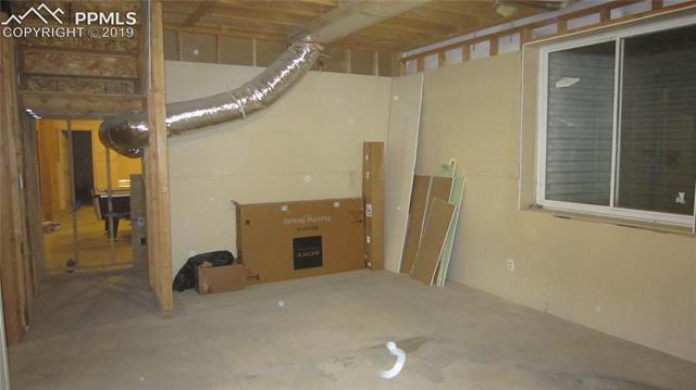 755 Edison Road Yoder, CO 80864 - Photo 28 of 29 one of framed in rooms in basement