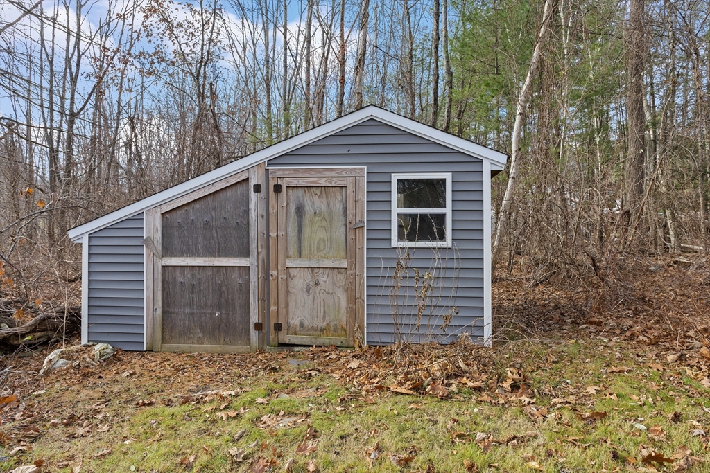 5 A Homestead Drive, Unit A Derry, NH 03038 - Photo 26 of 26 a view of a small house