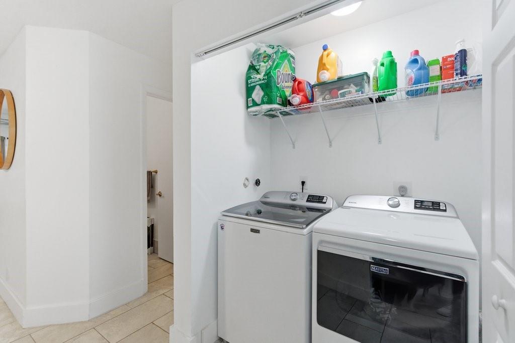 10900 West Sample Road Coral Springs, FL 33065 - Photo 14 of 32 a utility room with dryer and washer