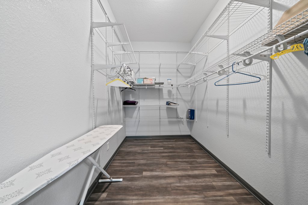 209 Lakeview Circle Spring Branch, TX 78070 - Photo 20 of 40 Spacious closet featuring dark wood-type flooring