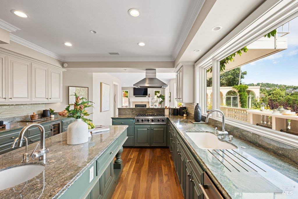 82 McNear Drive San Rafael, CA 94901 - Photo 21 of 54 a kitchen with stainless steel appliances granite countertop a sink stove and cabinets