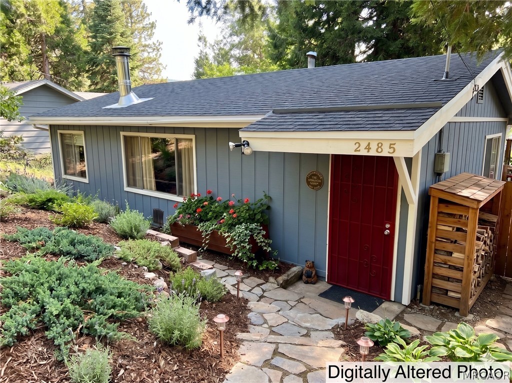 2485 Spring Drive Running Springs, CA 92382 - Photo 1 of 10 a view of a house with potted plants