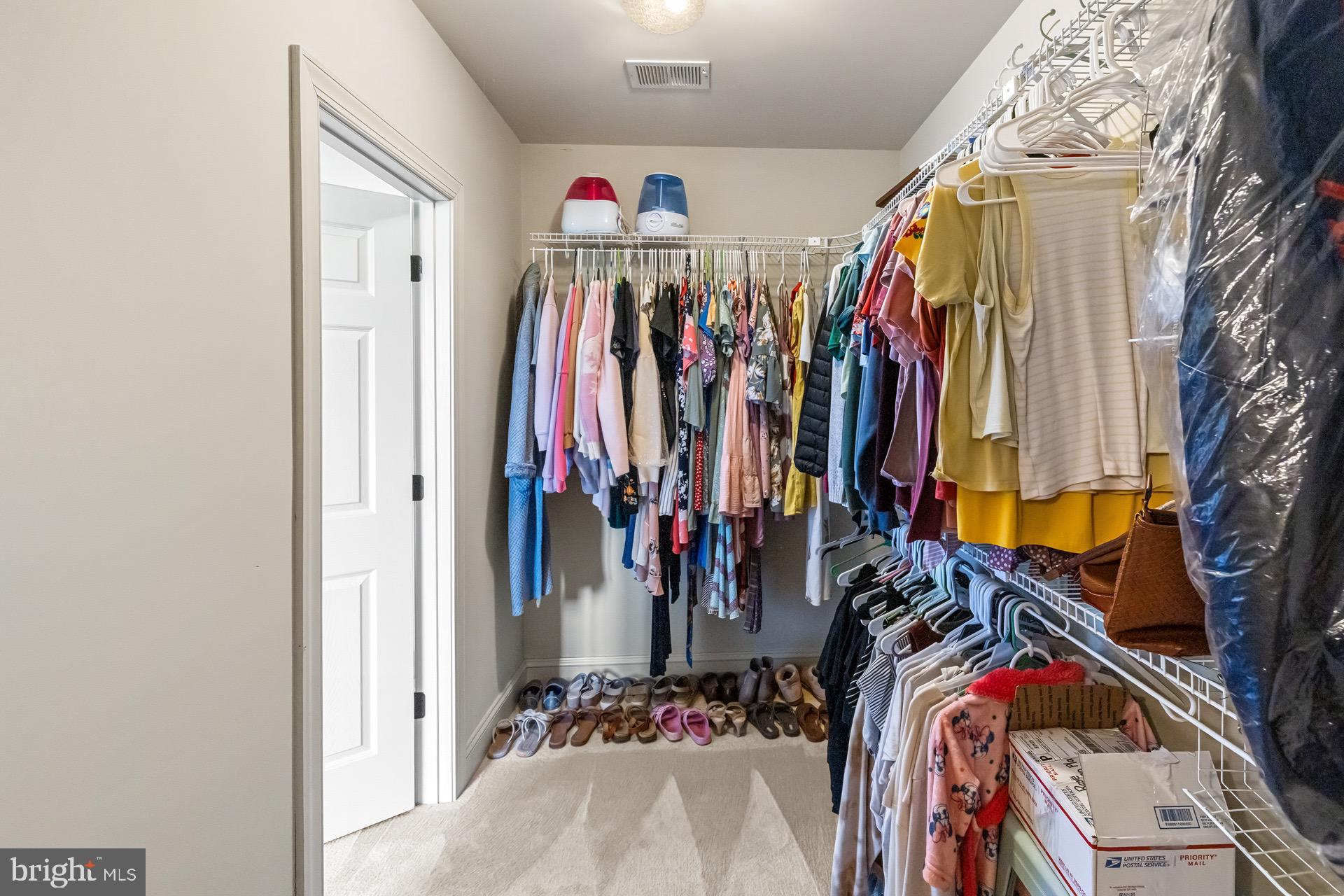 99 Hummingbird Court Dunkirk, MD 20754 - Photo 50 of 82 a view of walk in closet with clothes