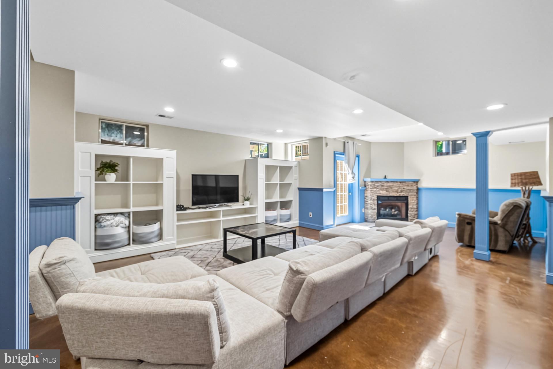 99 Hummingbird Court Dunkirk, MD 20754 - Photo 60 of 82 a bedroom with furniture and a flat screen tv