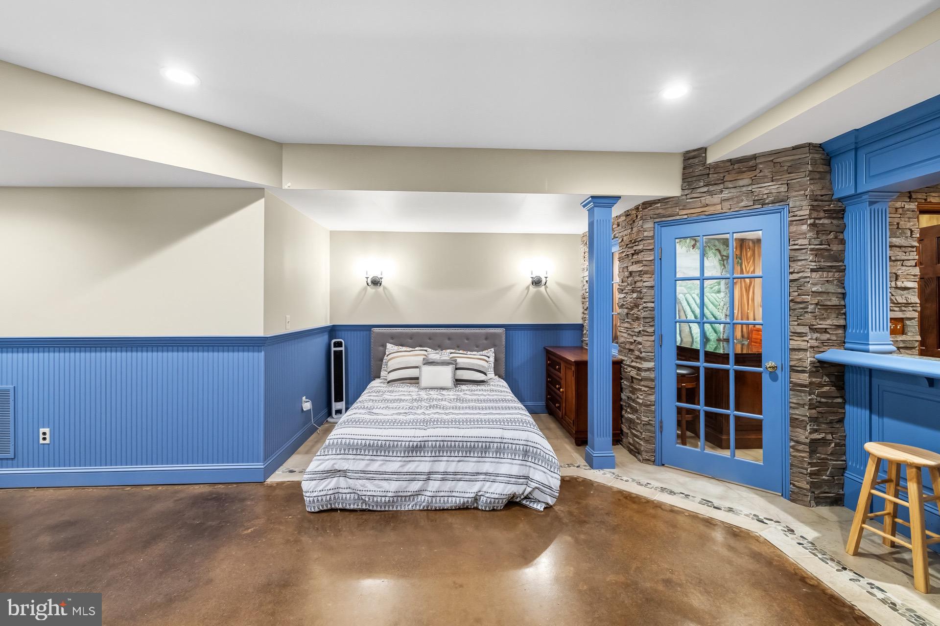 99 Hummingbird Court Dunkirk, MD 20754 - Photo 61 of 82 a spacious bedroom with a large bed and a large window