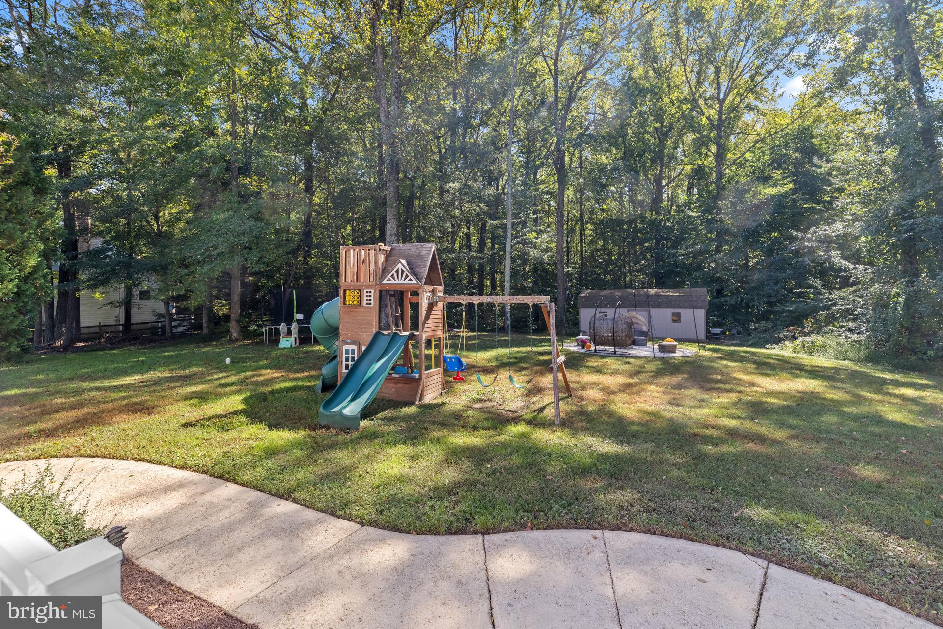 99 Hummingbird Court Dunkirk, MD 20754 - Photo 75 of 82 a view of a swimming pool with a yard