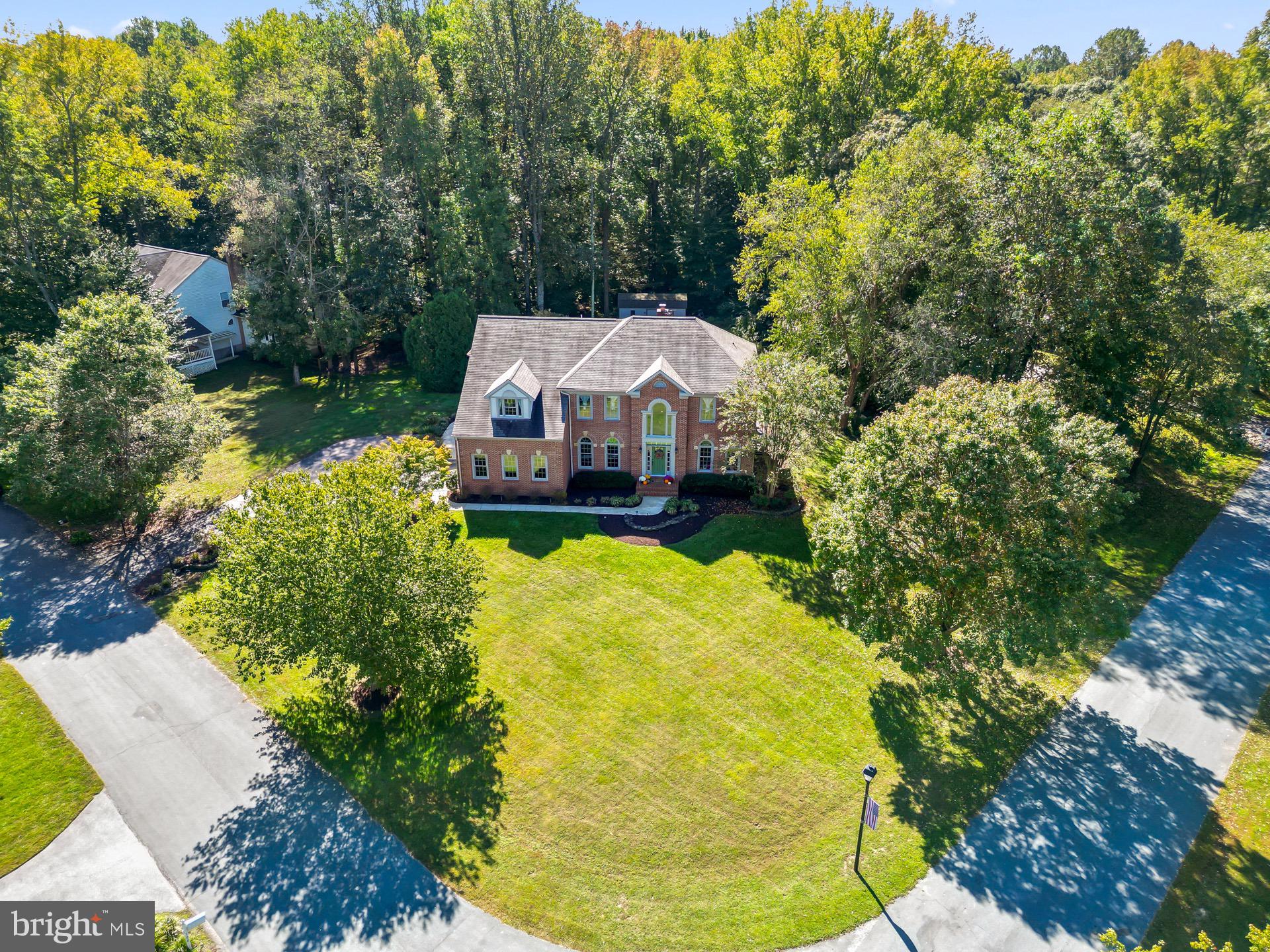 99 Hummingbird Court Dunkirk, MD 20754 - Photo 78 of 82 a view of a swimming pool with a garden