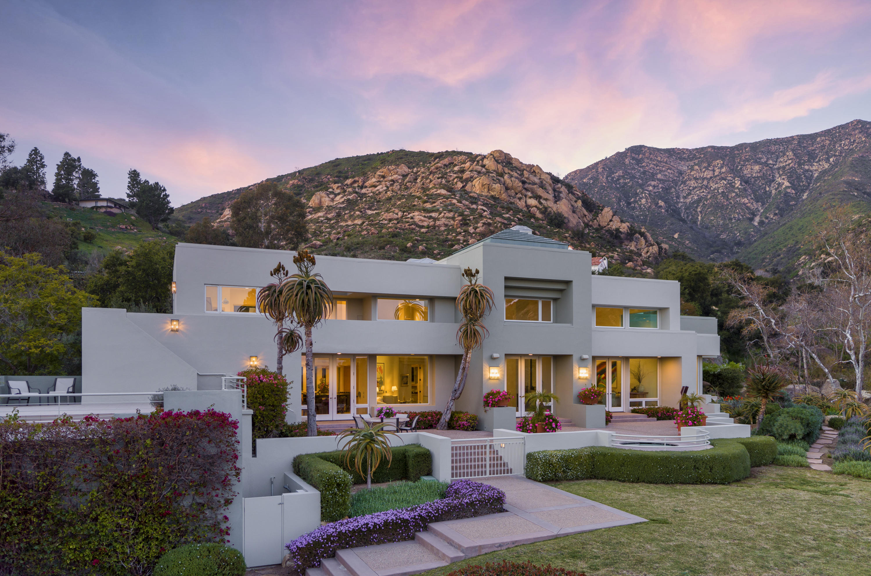 915 Park Lane Montecito, CA 93108 - Photo 1 of 33 a front view of a house with a yard and garage