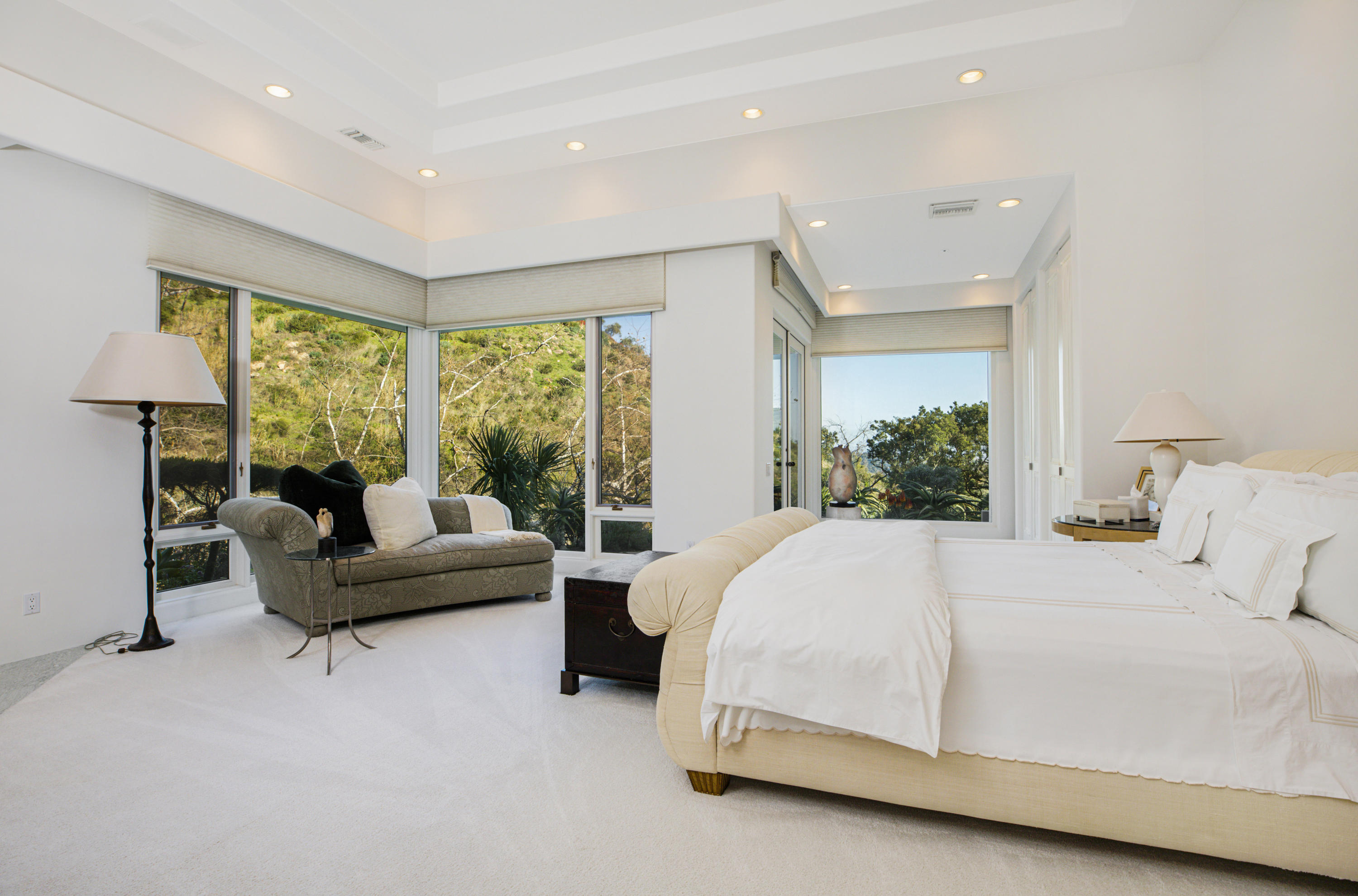 915 Park Lane Montecito, CA 93108 - Photo 12 of 33 a spacious bedroom with a bed and a couch