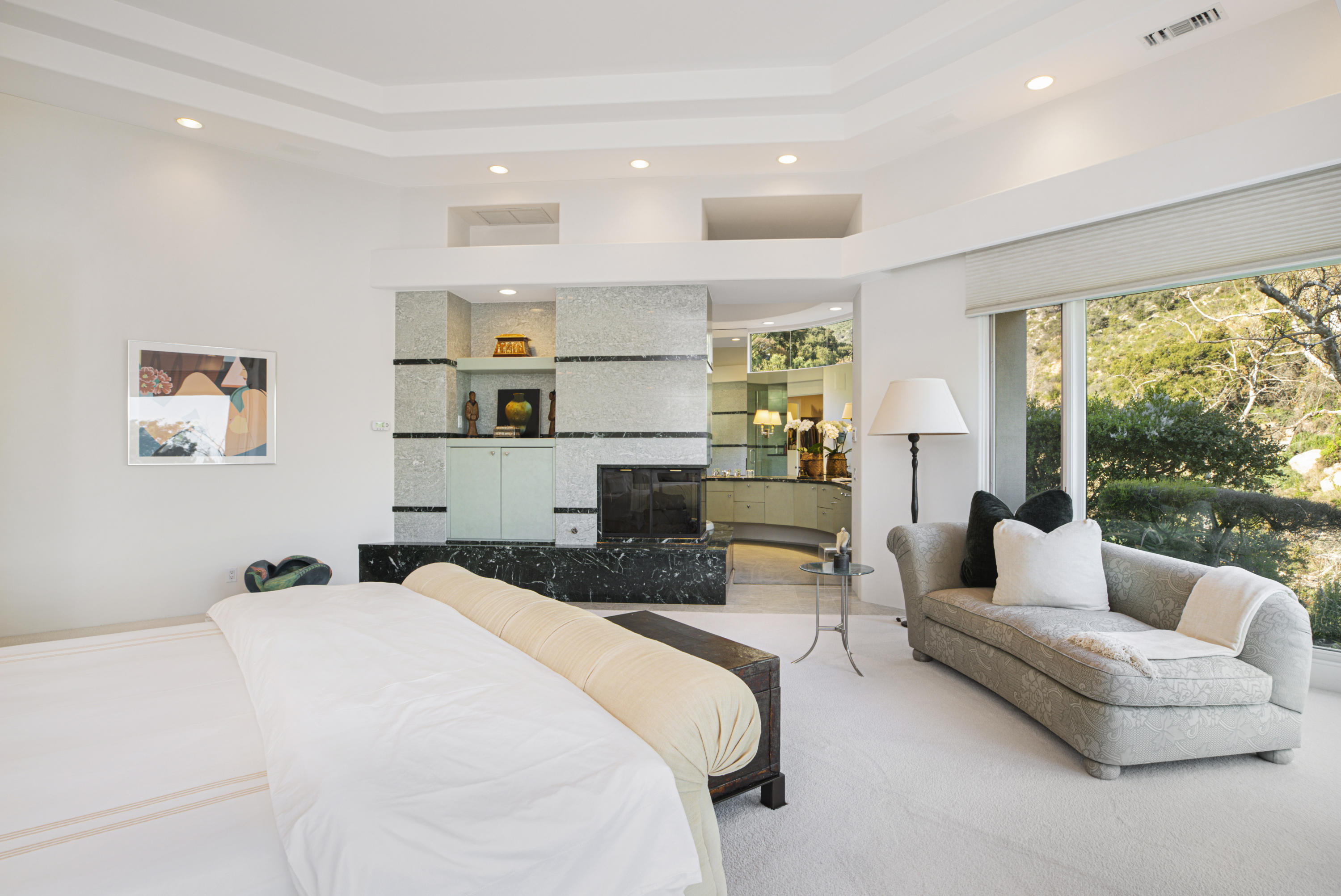 915 Park Lane Montecito, CA 93108 - Photo 13 of 33 a bedroom with a large bed and a couch