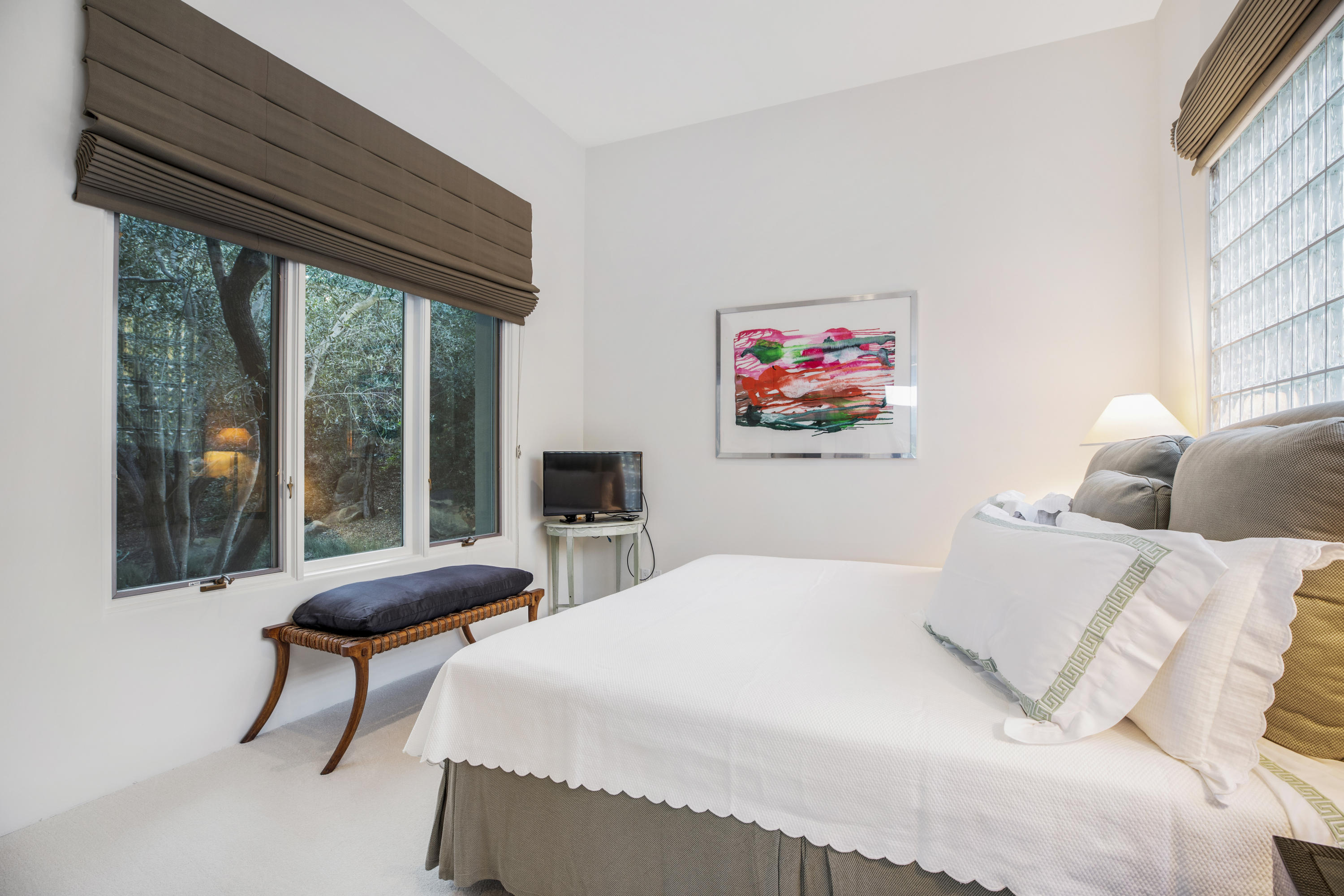 915 Park Lane Montecito, CA 93108 - Photo 15 of 33 a bedroom with a bed and a large window