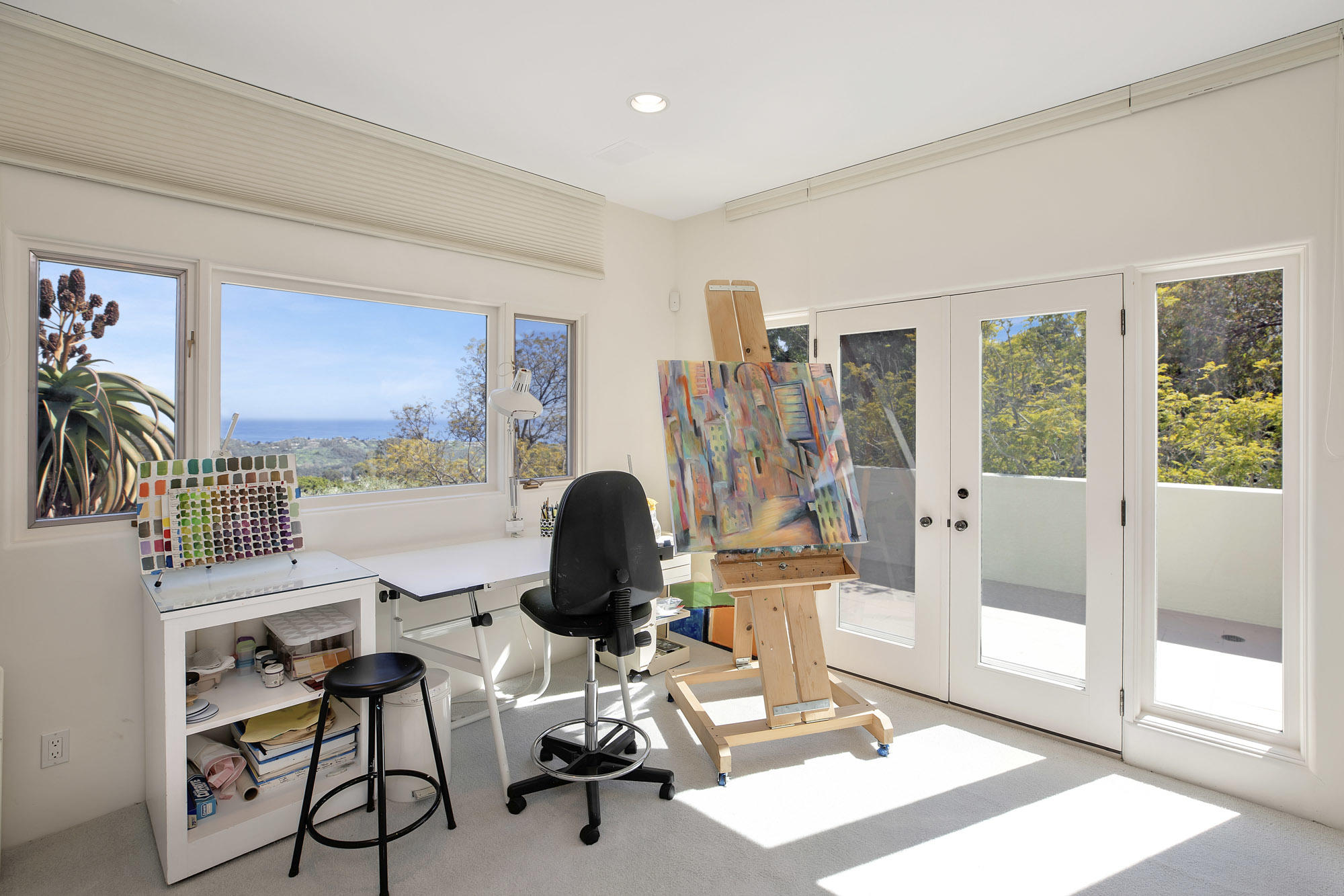 915 Park Lane Montecito, CA 93108 - Photo 19 of 33 a work room with furniture and a floor to ceiling window