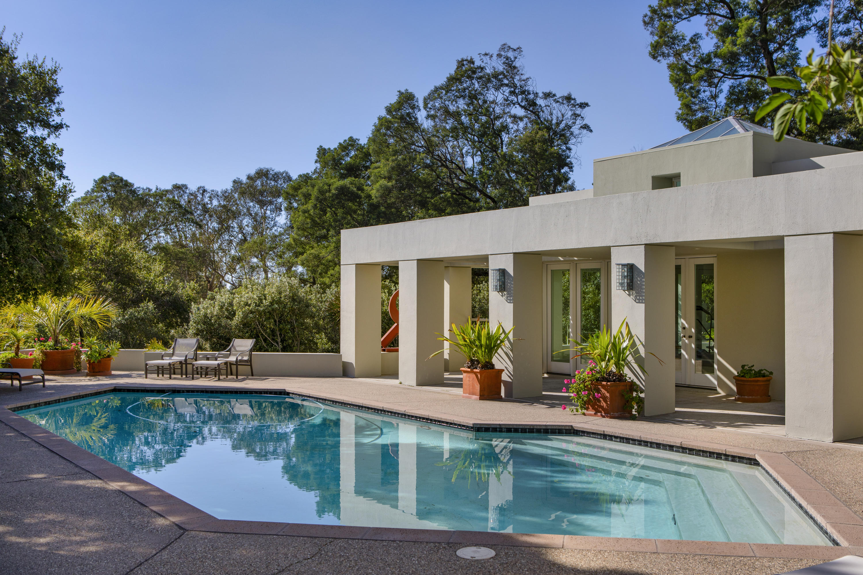 915 Park Lane Montecito, CA 93108 - Photo 29 of 33 swimming pool view with a seating space and a garden view