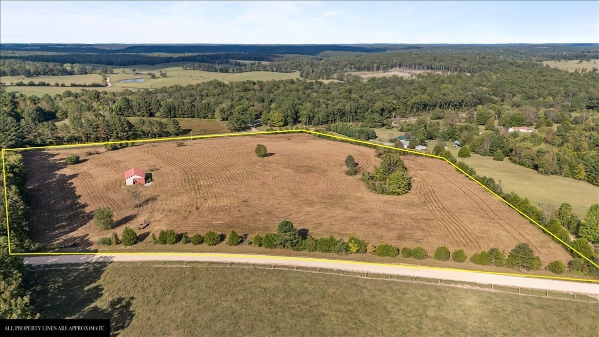 1849 Humphreys Co Line Road Dickson, TN 37055 - Photo 12 of 36 a view of a swimming pool with an ocean view