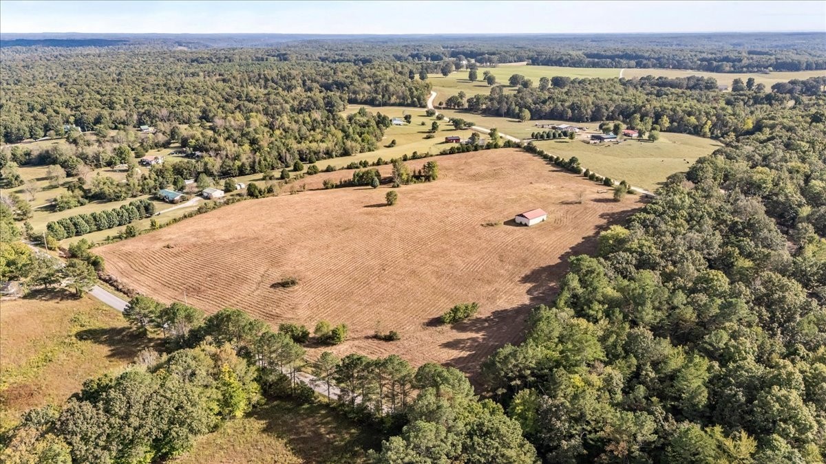 1849 Humphreys Co Line Road Dickson, TN 37055 - Photo 15 of 36 an aerial view of residential houses with outdoor space