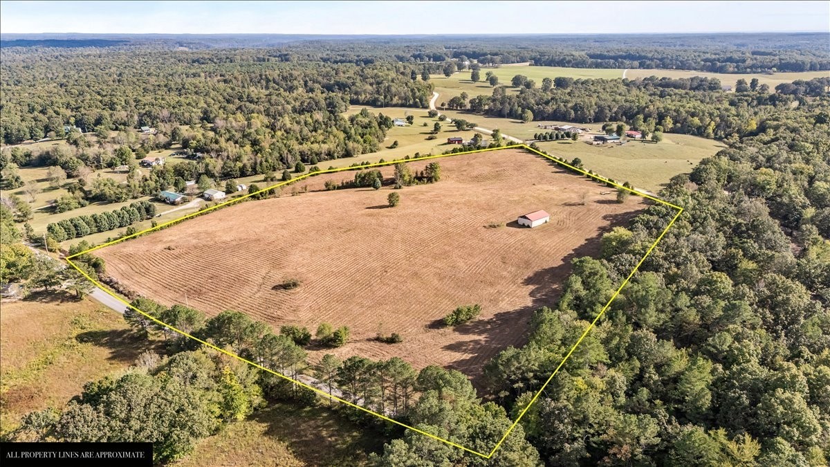 1849 Humphreys Co Line Road Dickson, TN 37055 - Photo 16 of 36 an aerial view of residential houses with outdoor space