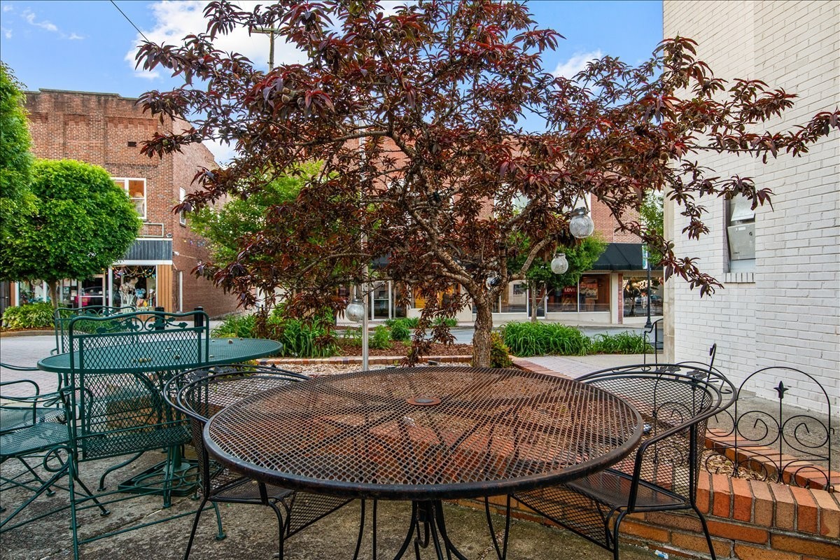 1849 Humphreys Co Line Road Dickson, TN 37055 - Photo 32 of 36 a view of a house with backyard and sitting area