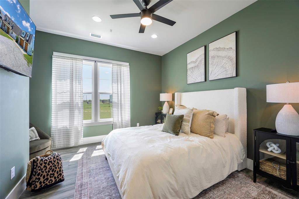 12345 Flow Road Krum, TX 76249 - Photo 21 of 38 Bedroom featuring baseboards, visible vents, wood finished floors, and recessed lighting