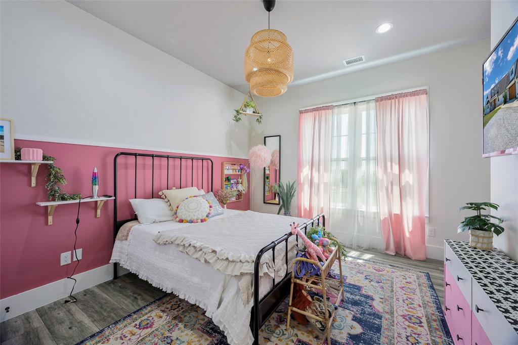 12345 Flow Road Krum, TX 76249 - Photo 23 of 38 Bedroom featuring wood finished floors, recessed lighting, visible vents, and baseboards