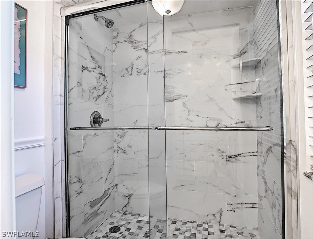 1645 Sand Castle Road Sanibel, FL 33957 - Photo 6 of 34 a bathroom with a shower