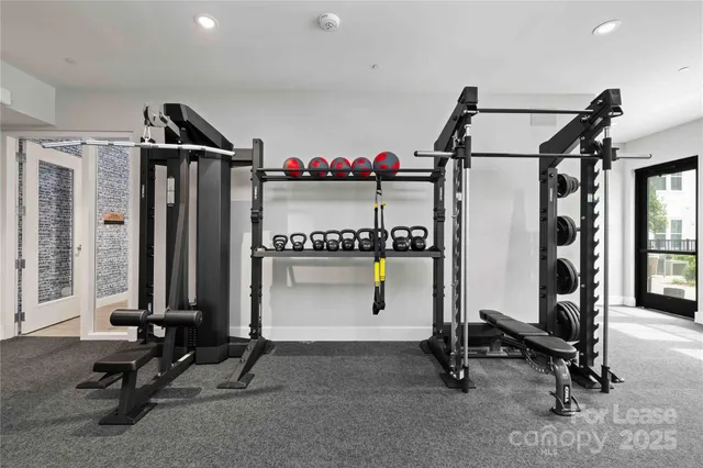 a view of a room with gym equipment