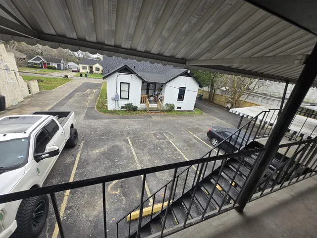 a view of swimming pool with seating area