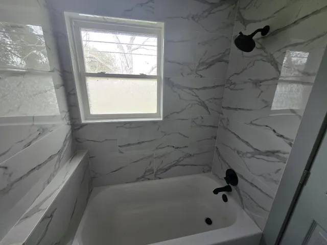 a bathroom with a bathtub