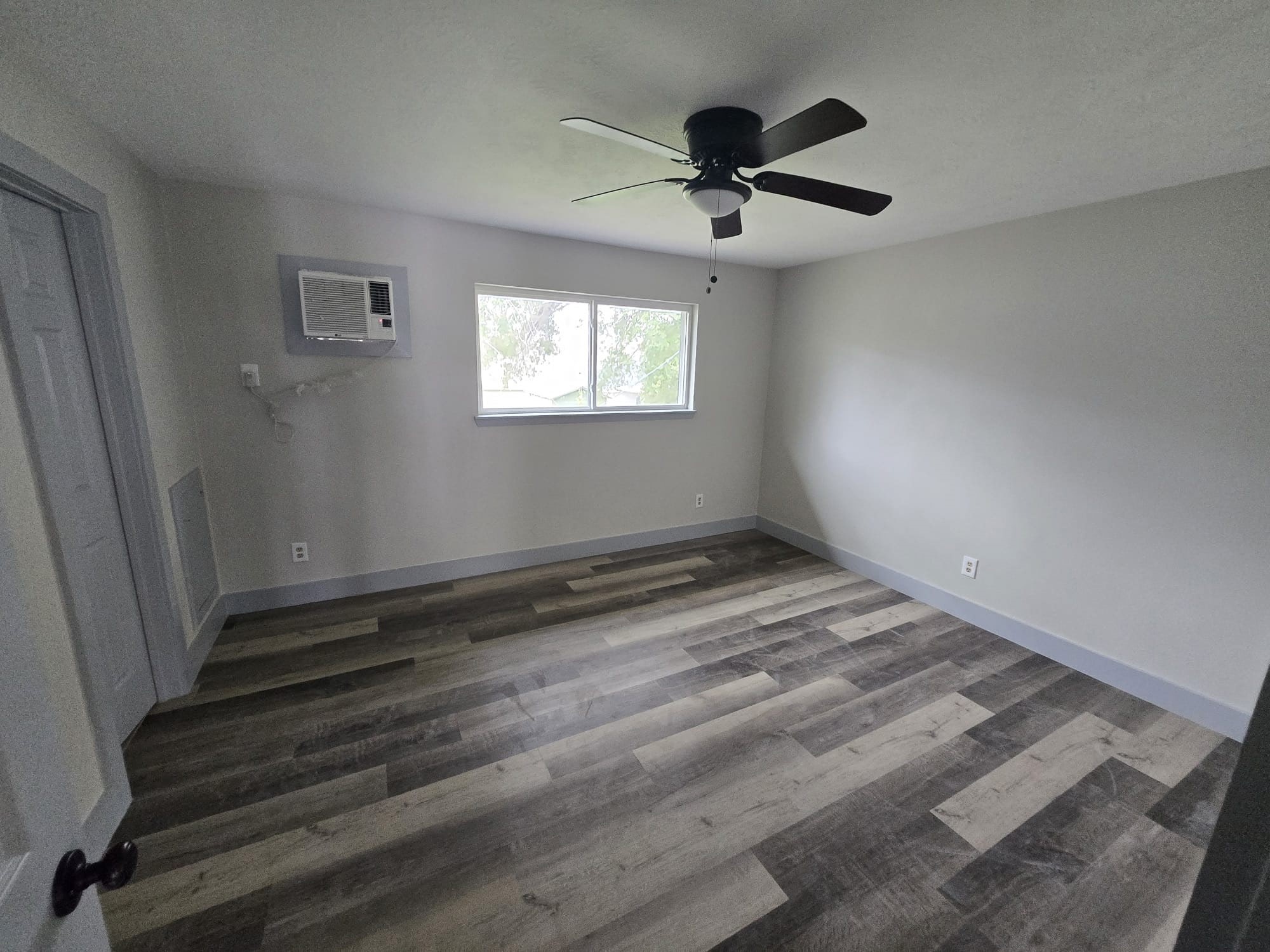 8335 Bonner Drive, Unit 2 Houston, TX 77017 - Photo 6 of 10 a view of room and wooden floor