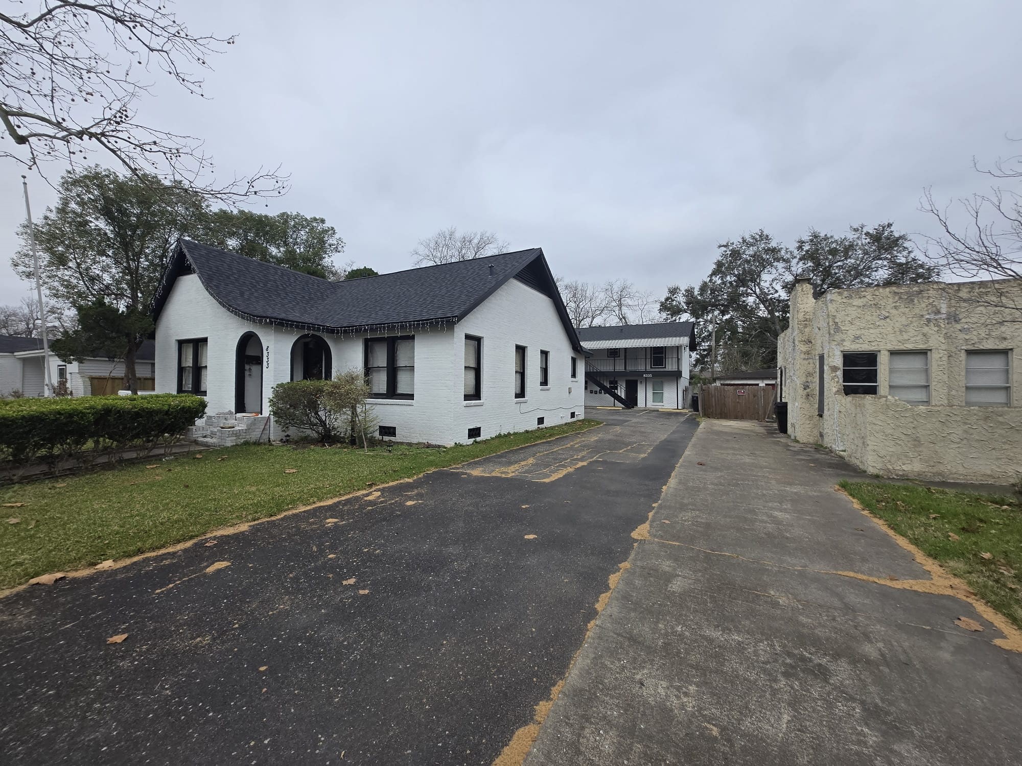 8335 Bonner Drive, Unit 2 Houston, TX 77017 - Photo 10 of 10 a front view of a house with a yard and garage