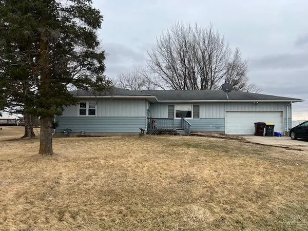 a house view with a backyard space
